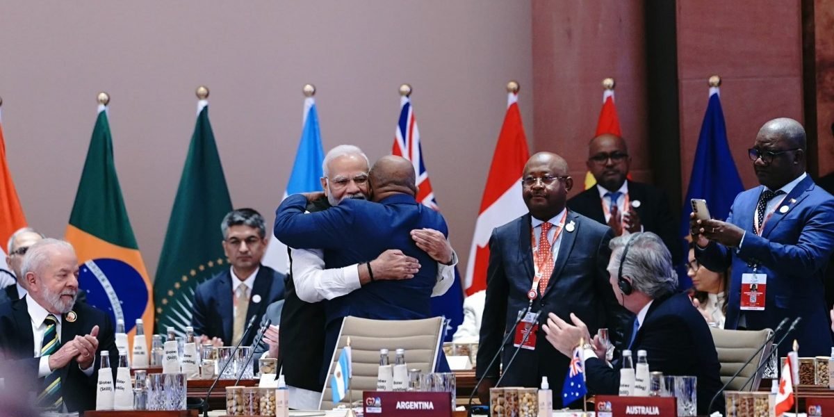 Prime Minister Narendra Modi hugs current chair of the African Union, President of Comoros Azali Assoumani. Photo: X/@MEAIndia